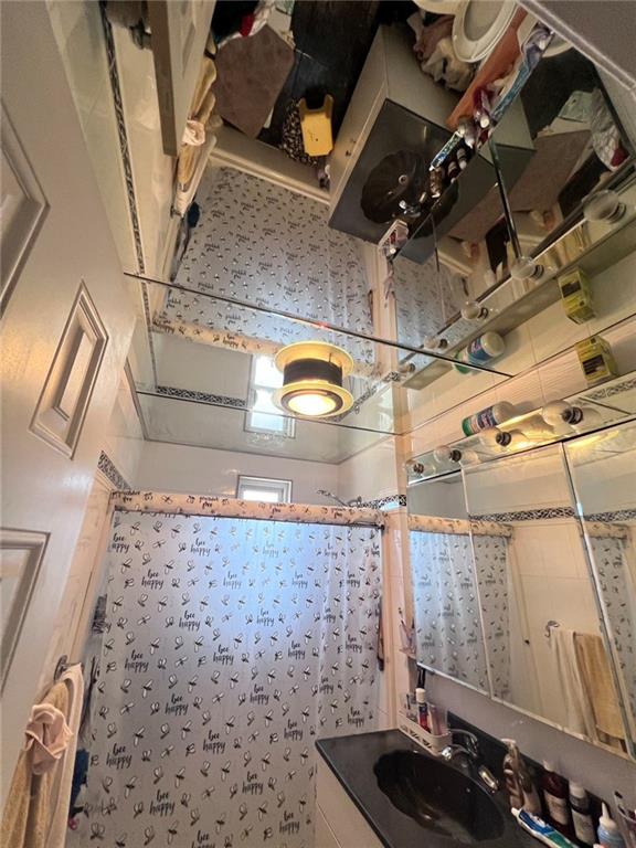 3708 Shore Pkwy, Brooklyn, NY 11235 - bathroom featuring vanity
