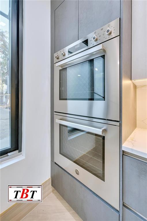 kitchen with stainless steel double oven