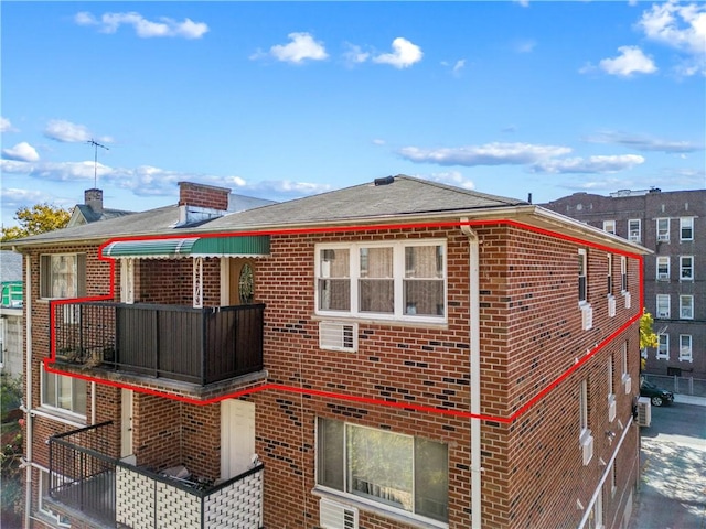 back of property with brick siding