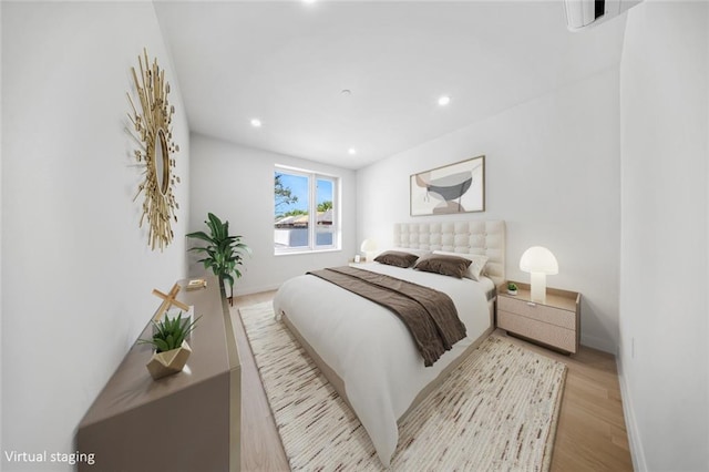 bedroom with light wood-type flooring