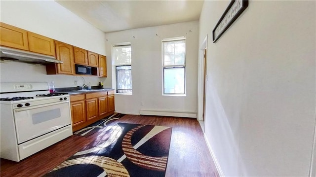 kitchen with baseboard heating, dark hardwood / wood-style floors, sink, and gas range gas stove