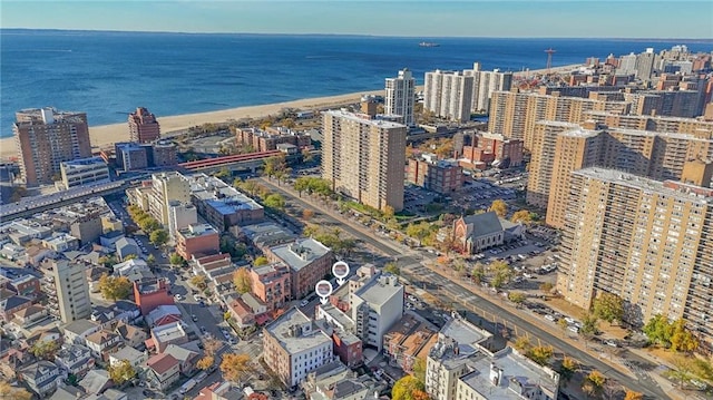 aerial view with a city view and a water view