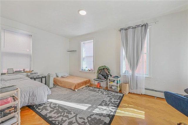 bedroom with parquet flooring