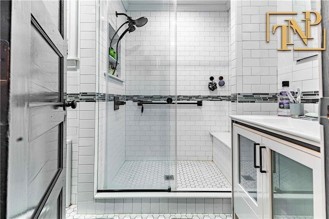 bathroom featuring vanity and walk in shower