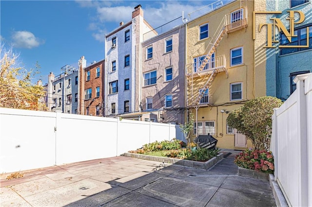 view of property featuring fence