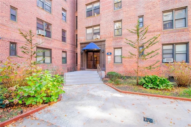 15 Oliver St Unit 4C, Brooklyn, NY 11209 - doorway to property featuring brick siding and cooling unit