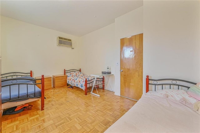 bedroom with a wall mounted air conditioner