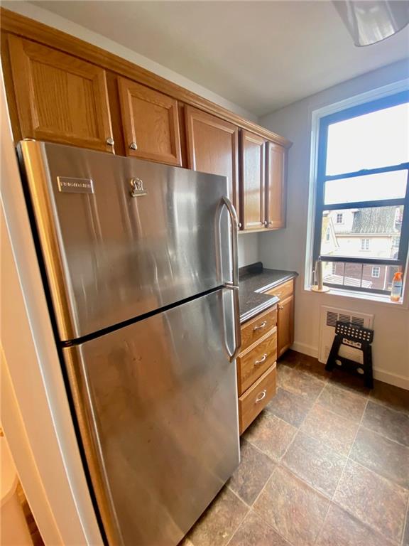 kitchen featuring stainless steel refrigerator