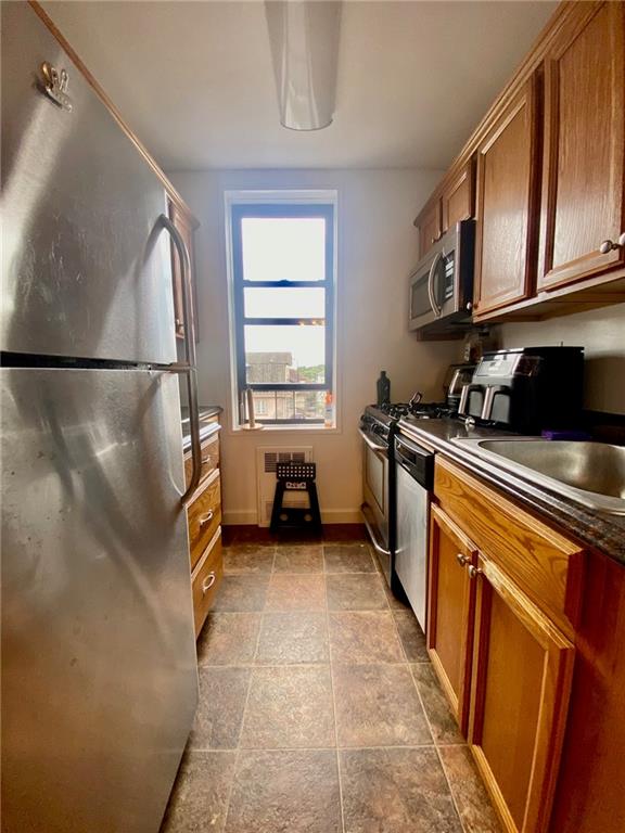 kitchen featuring sink and appliances with stainless steel finishes