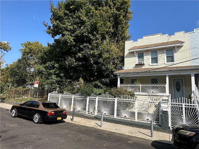 view of front of property featuring covered porch