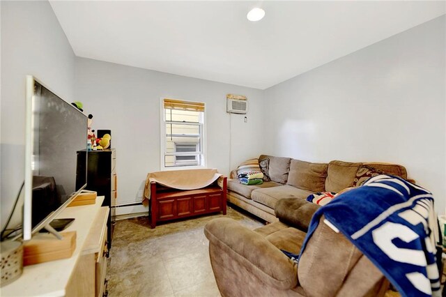 living room with a baseboard radiator and a wall mounted air conditioner