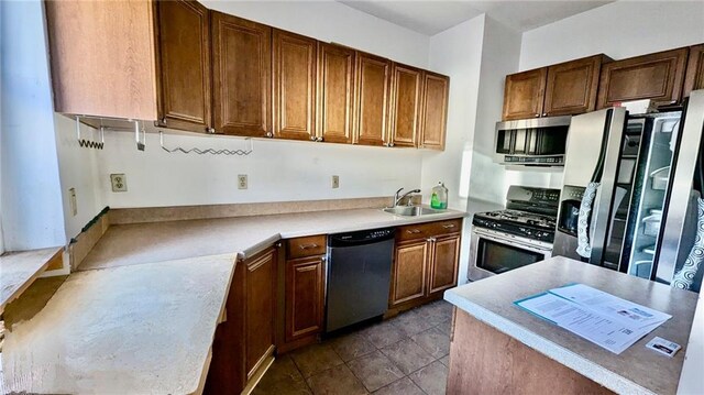 kitchen featuring sink and stainless steel appliances