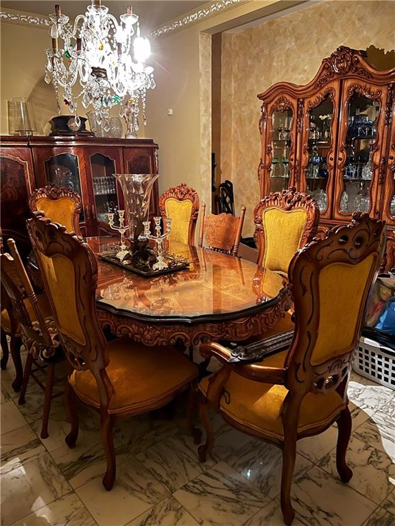 dining room featuring a notable chandelier