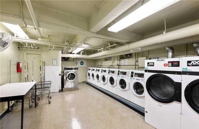 laundry room featuring separate washer and dryer