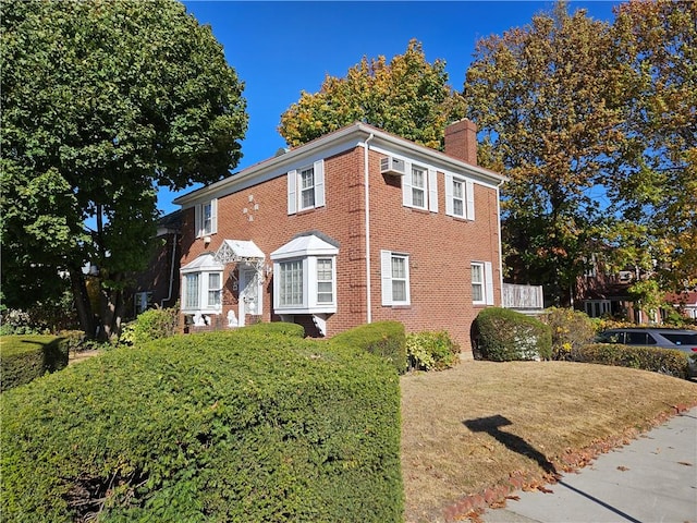 view of front of property with a front lawn