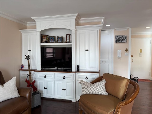 living room featuring ornamental molding, dark wood-style flooring, and recessed lighting