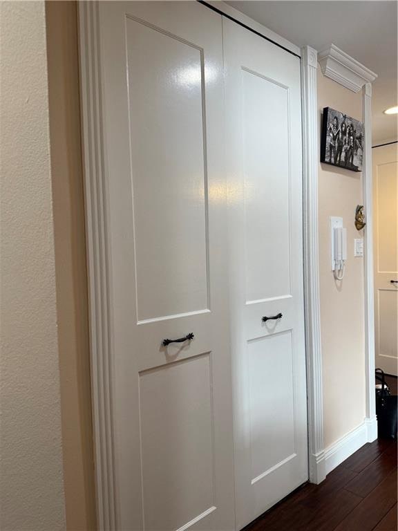 details with baseboards and wood finished floors