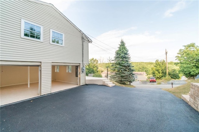 view of patio / terrace featuring a garage