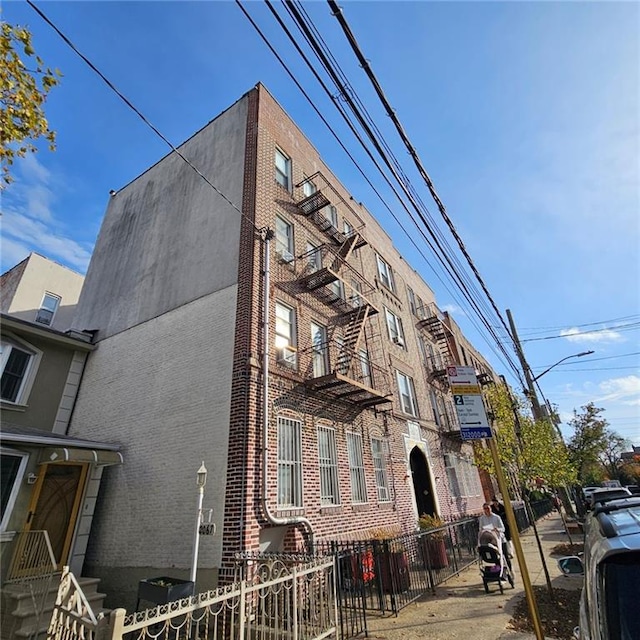 2069 E 12th St, Brooklyn, NY 11229 - view of building exterior with fence