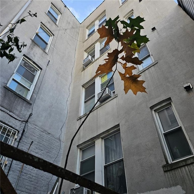 view of property with cooling unit