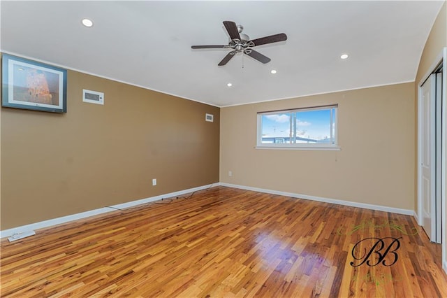 unfurnished bedroom with recessed lighting, visible vents, light wood-style flooring, and baseboards