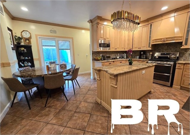 kitchen featuring a center island, tasteful backsplash, premium range hood, crown molding, and appliances with stainless steel finishes