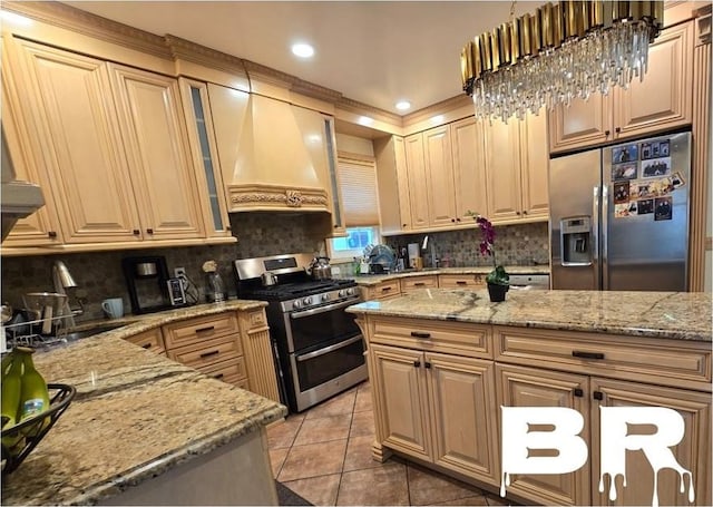 kitchen featuring stainless steel appliances, premium range hood, light stone countertops, and light tile patterned floors