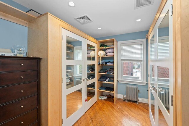 pantry with french doors and radiator