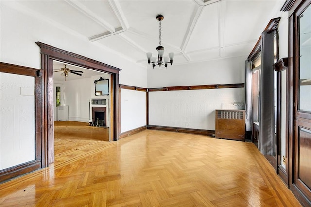 interior space with parquet flooring and an inviting chandelier