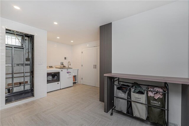 laundry area with washer and dryer