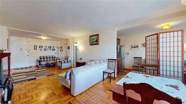 living room with light parquet flooring