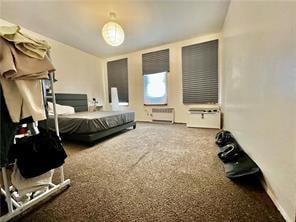 bedroom featuring radiator heating unit