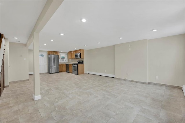 unfurnished living room featuring baseboard heating