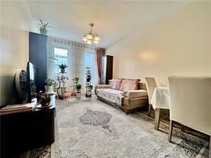 living room with a chandelier