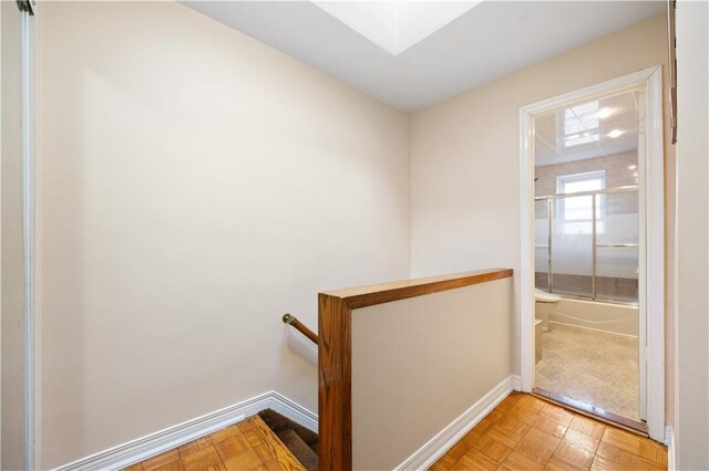 hallway with light parquet flooring