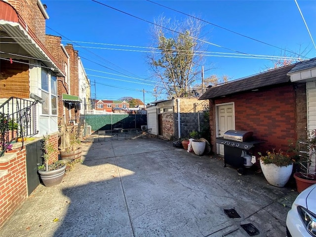 view of patio with a grill