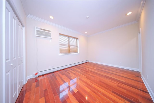 unfurnished bedroom featuring a baseboard radiator, baseboards, wood finished floors, and ornamental molding