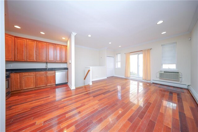 kitchen featuring wood-type flooring, stove, stainless steel dishwasher, and crown molding