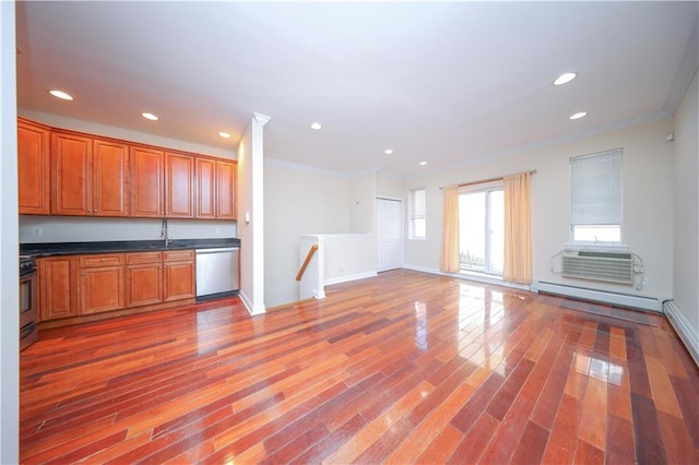 kitchen featuring stove, wood finished floors, crown molding, and stainless steel dishwasher