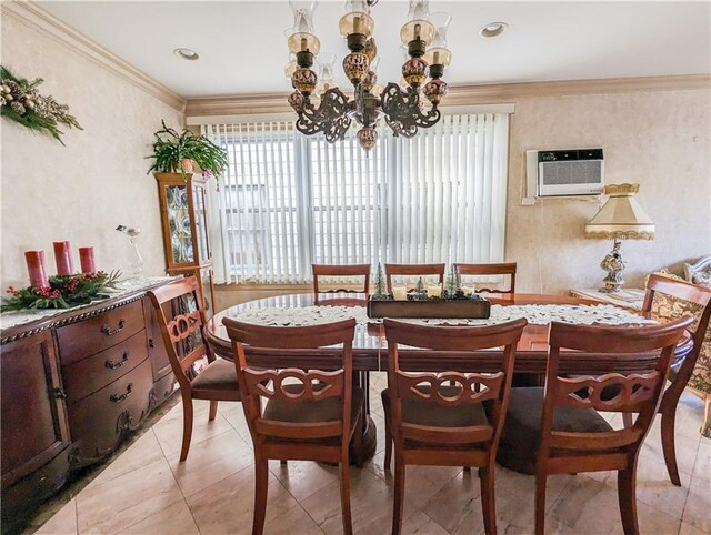 dining room with an AC wall unit, crown molding, and a notable chandelier