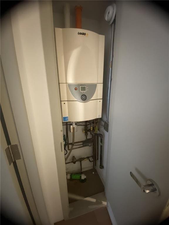 234 E 70th St Unit 4, New York, NY 10021 - detailed view of water heater and baseboards