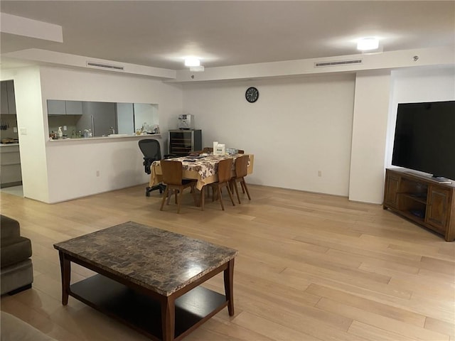 living room with light wood-type flooring