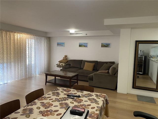 234 E 70th St Unit 4, New York, NY 10021 - living area featuring light wood-style flooring and wine cooler