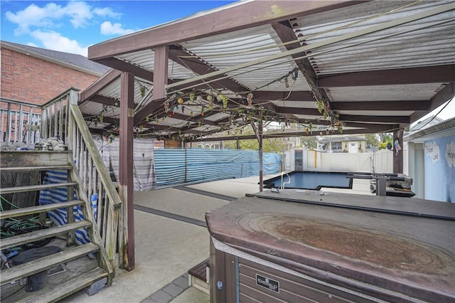 view of patio featuring a hot tub