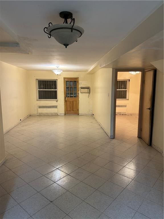 2069 E 55th St, Brooklyn, NY 11234 - interior space featuring baseboards and radiator