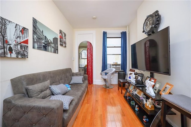 living room featuring hardwood / wood-style floors and cooling unit