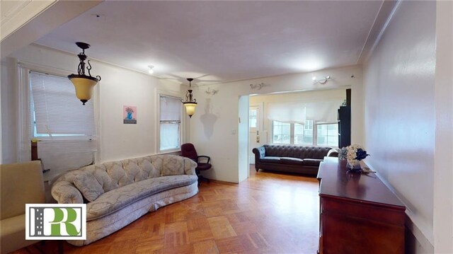 living room featuring parquet flooring