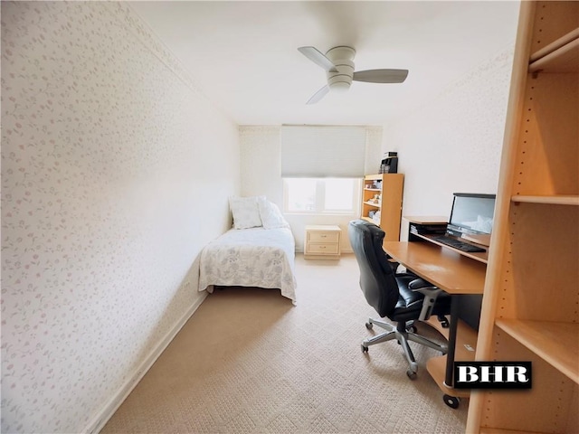 home office featuring carpet and ceiling fan