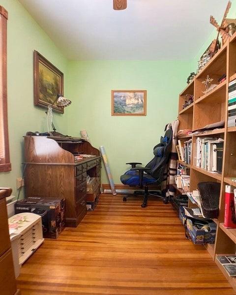 interior space featuring light wood-type flooring and ceiling fan