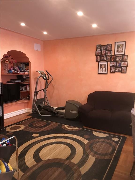 living room featuring parquet flooring